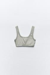 FADED-EFFECT RIBBED CROP TOP WITH RIPS