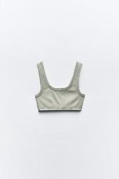 FADED-EFFECT RIBBED CROP TOP WITH RIPS