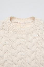 CABLE-KNIT SWEATER