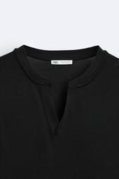 T-SHIRT WITH BUTTONED NECK