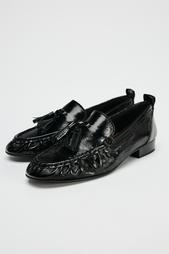 LEATHER LOAFERS WITH TASSELS