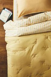 CHILDREN'S PEANUTS™ QUILT WITH TOPSTITCHING